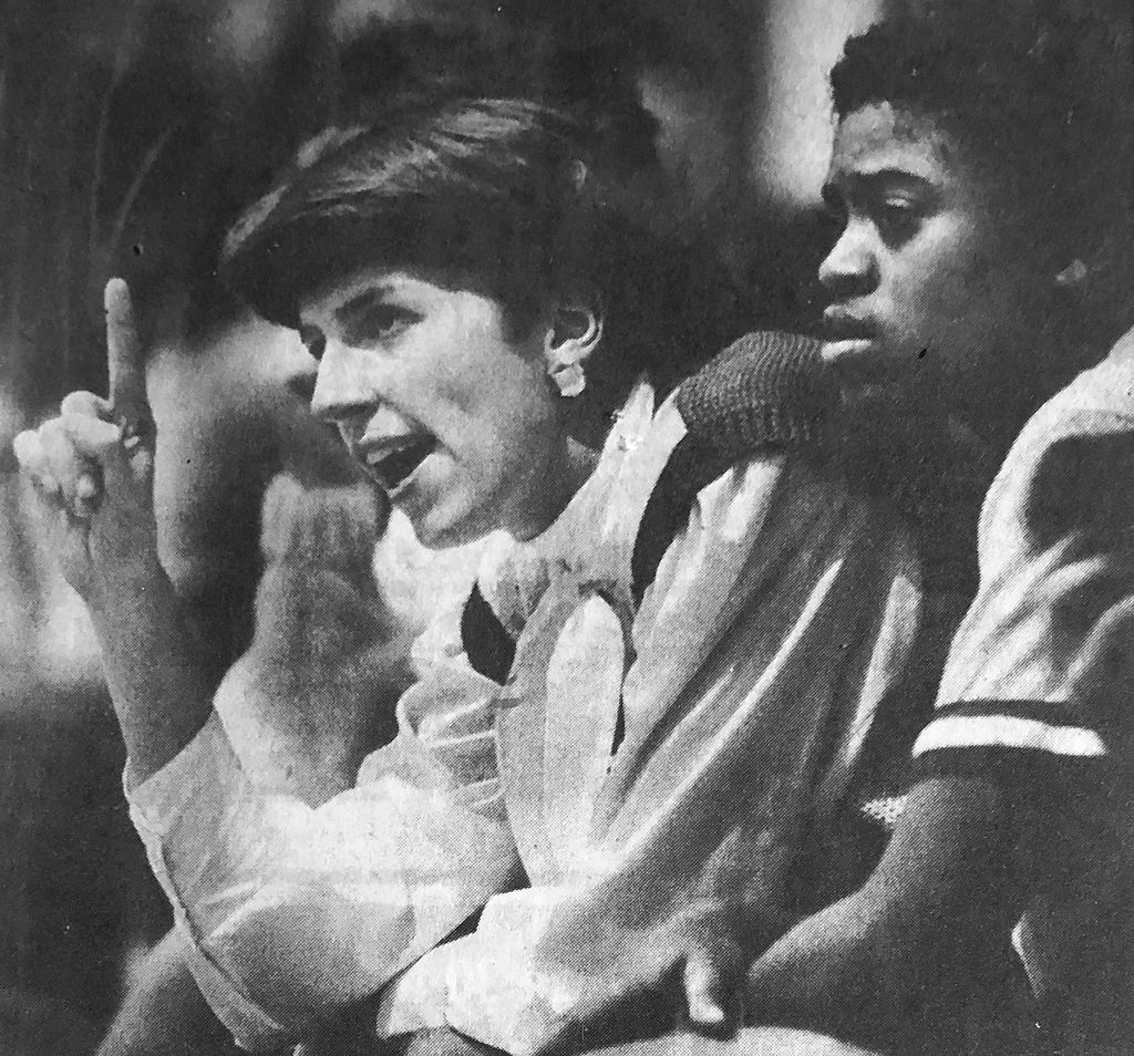 Lisa Holt talks to her players from the sidelines during a game against Hickman.